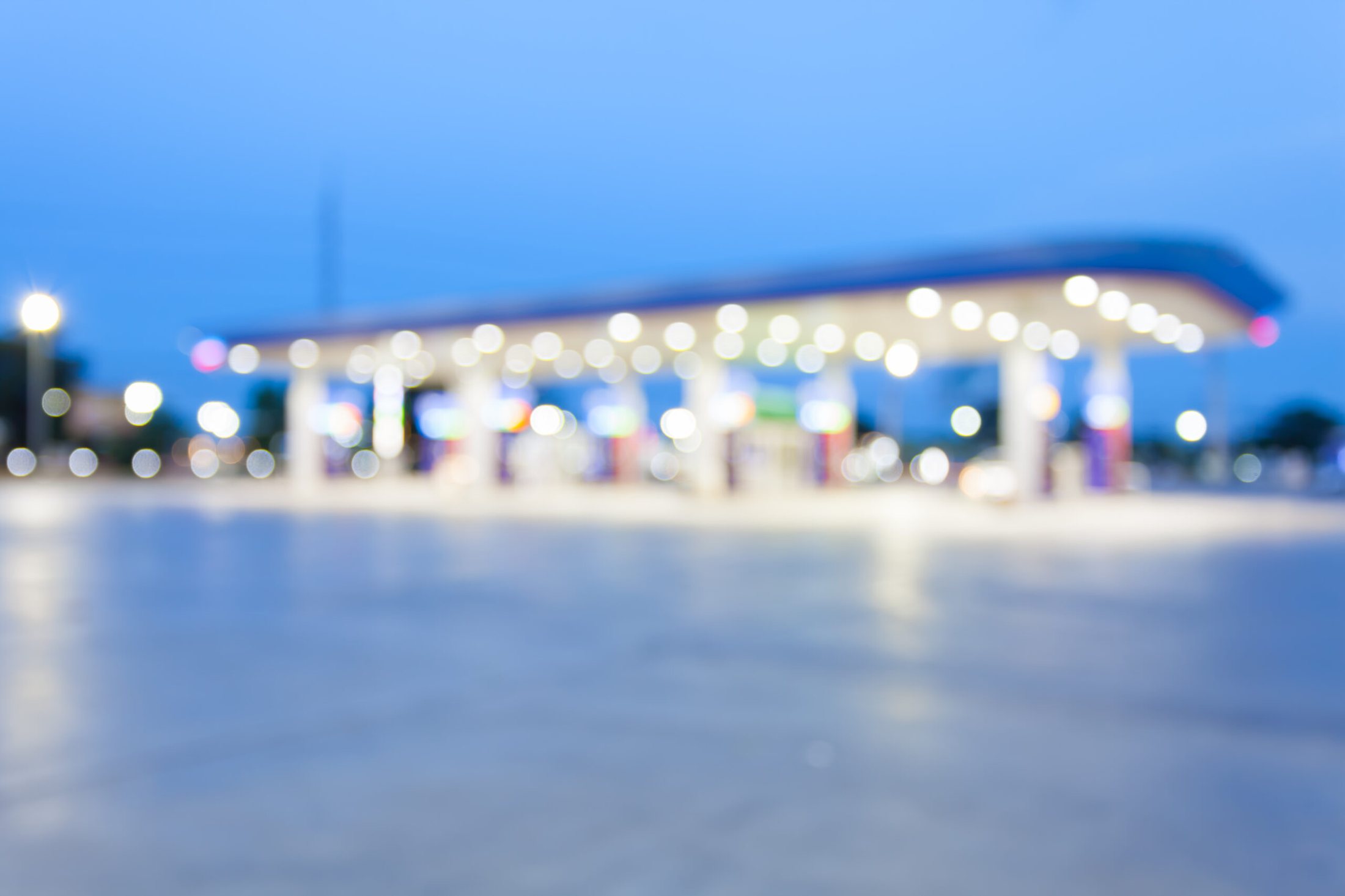 Fuel station lights at dusk